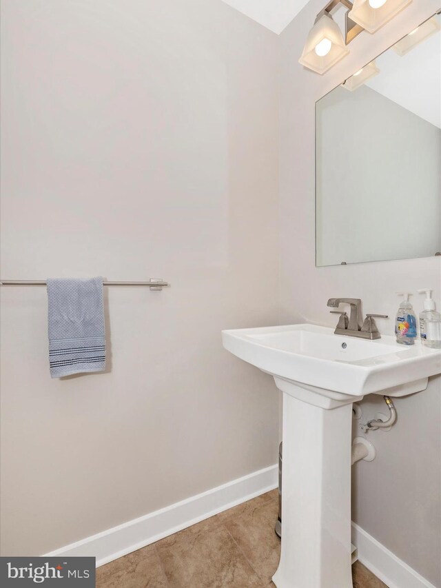 6538 Autumn Olive Dr, Frederick, MD 21703 - bathroom featuring tile patterned floors and baseboards