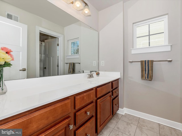 6538 Autumn Olive Dr, Frederick, MD 21703 - full bath with tile patterned flooring, vanity, visible vents, and baseboards