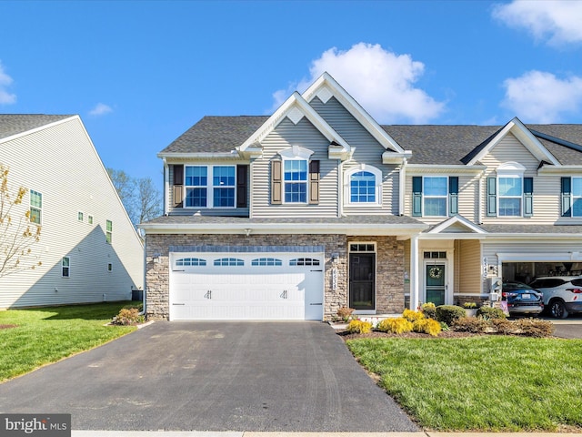 6538 Autumn Olive Dr, Frederick, MD 21703 - view of front of property with roof with shingles, an attached garage, stone siding, and aphalt driveway