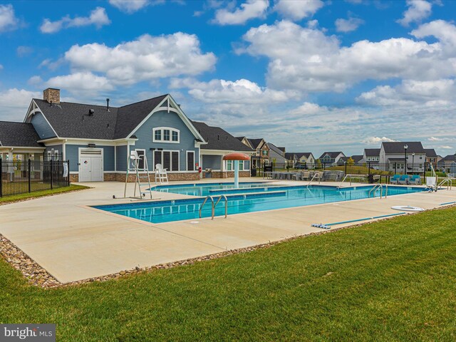 6538 Autumn Olive Dr, Frederick, MD 21703 - pool featuring a residential view, fence, a patio, and a lawn