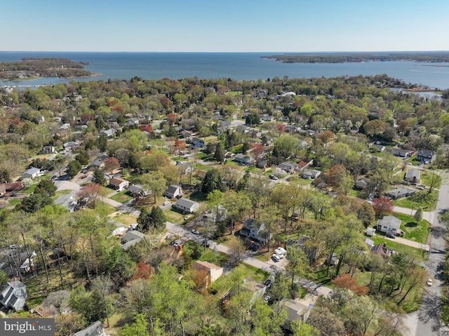 bird's eye view with a water view and a residential view