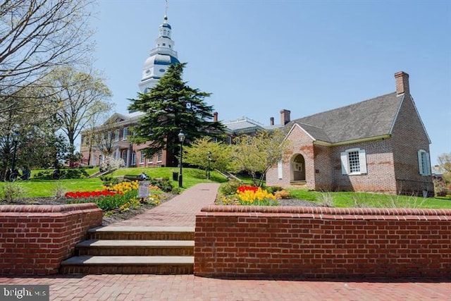 view of community featuring a lawn