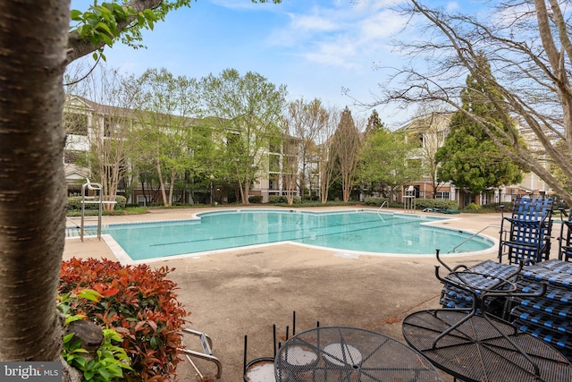 pool featuring a patio area