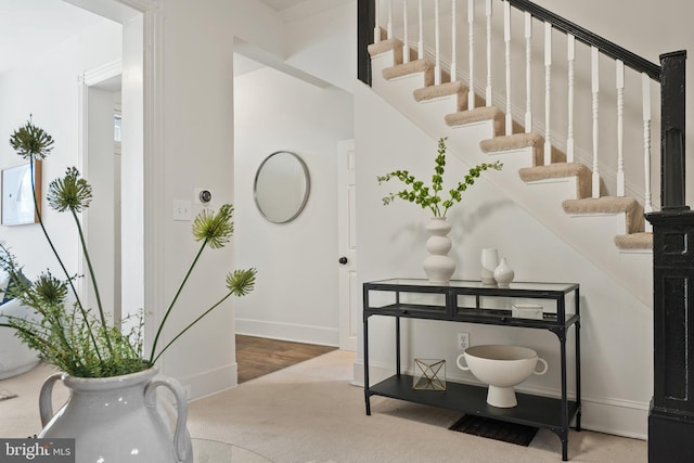 18 Rhode Island Ave NE, Washington, DC 20002 - entryway with baseboards, stairway, and carpet