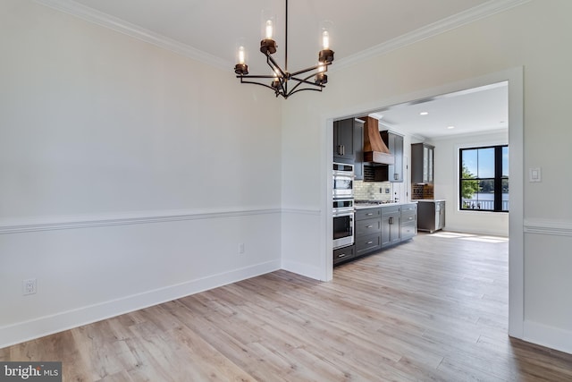 14671 Banks Odee Rd, Newburg, MD 20664 - kitchen featuring light wood finished floors, baseboards, a notable chandelier, and ornamental molding