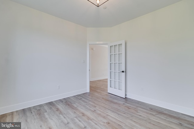 14671 Banks Odee Rd, Newburg, MD 20664 - unfurnished room featuring baseboards, french doors, and wood finished floors