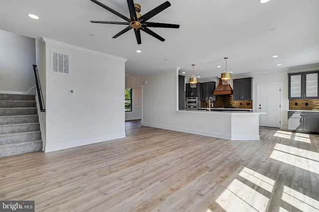 14671 Banks Odee Rd, Newburg, MD 20664 - unfurnished living room with recessed lighting, visible vents, a ceiling fan, and ornamental molding