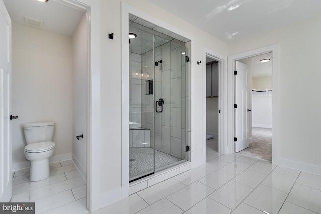 14671 Banks Odee Rd, Newburg, MD 20664 - full bathroom with a walk in closet, baseboards, toilet, and a stall shower