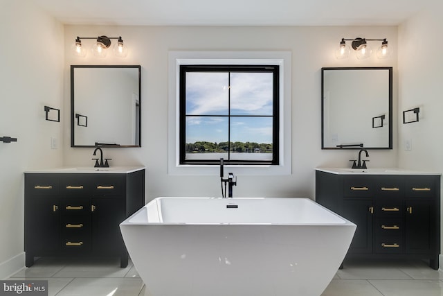 14671 Banks Odee Rd, Newburg, MD 20664 - full bath featuring two vanities, tile patterned floors, and a sink