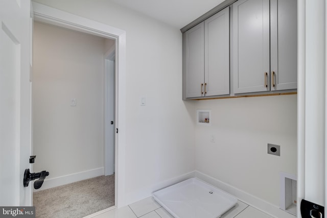 14671 Banks Odee Rd, Newburg, MD 20664 - washroom featuring hookup for an electric dryer, carpet floors, hookup for a washing machine, baseboards, and cabinet space