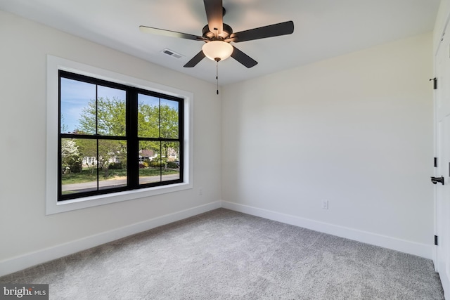 14671 Banks Odee Rd, Newburg, MD 20664 - spare room with baseboards, visible vents, carpet flooring, and ceiling fan