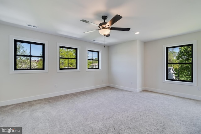 14671 Banks Odee Rd, Newburg, MD 20664 - empty room featuring plenty of natural light, visible vents, baseboards, and light colored carpet