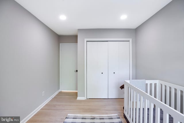 5901 Kingsford Rd Unit 440, Springfield, VA 22152 - bedroom with recessed lighting, baseboards, light wood-style flooring, and a closet