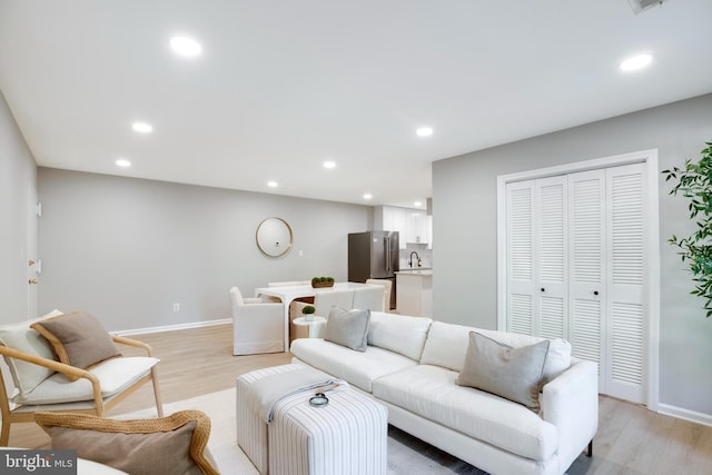 5901 Kingsford Rd Unit 440, Springfield, VA 22152 - living area with recessed lighting, baseboards, and light wood finished floors