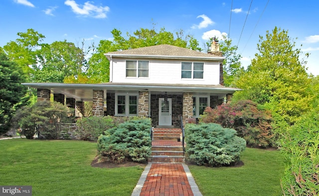 201 S 10th St, North Wales, PA 19454 - american foursquare style home featuring a chimney, a front yard, and stone siding