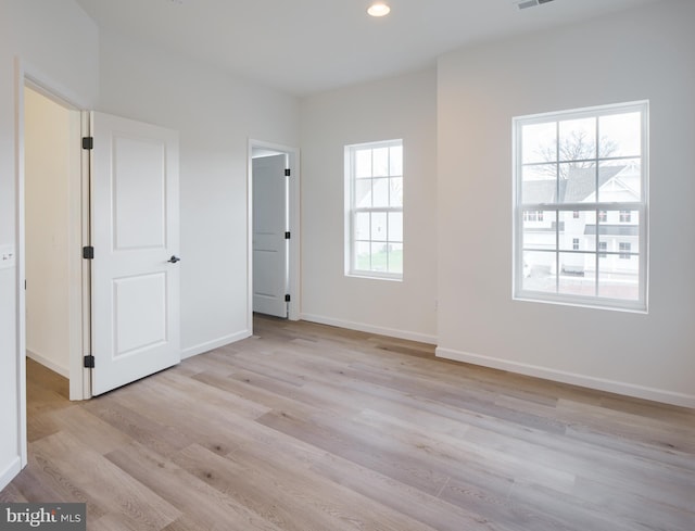 75 Cori Dr, Gilbertsville, PA 19525 - unfurnished bedroom featuring light wood-style flooring, baseboards, visible vents, and recessed lighting