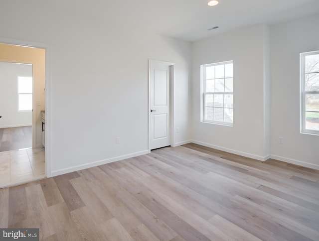 75 Cori Dr, Gilbertsville, PA 19525 - spare room featuring visible vents, baseboards, light wood finished floors, and recessed lighting
