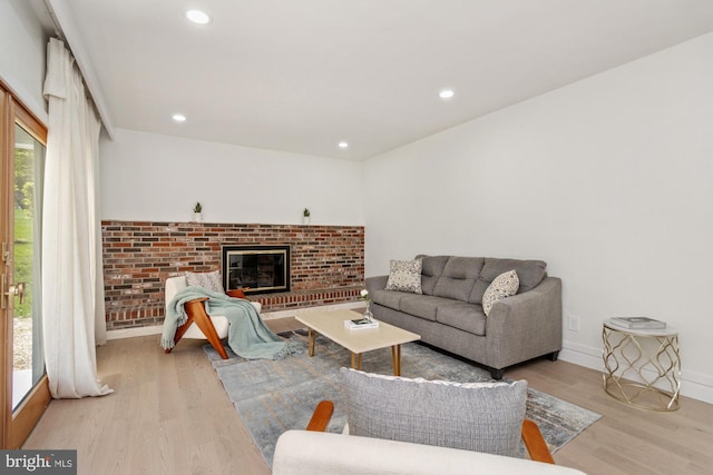 1242 Clearfield Cir, Lutherville Timonium, MD 21093 - living area with a fireplace, wood finished floors, baseboards, and recessed lighting