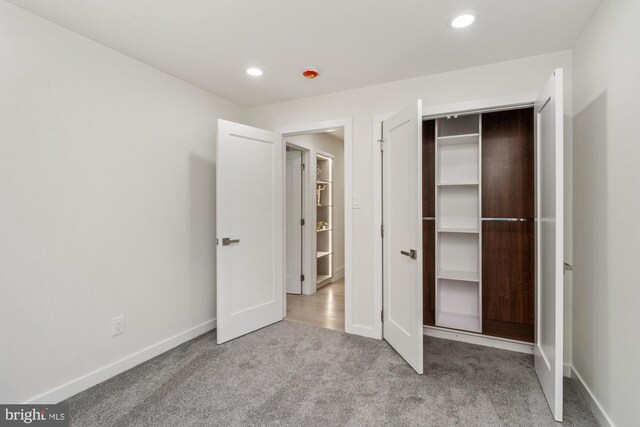 1242 Clearfield Cir, Lutherville Timonium, MD 21093 - unfurnished bedroom with recessed lighting, baseboards, carpet, and a closet