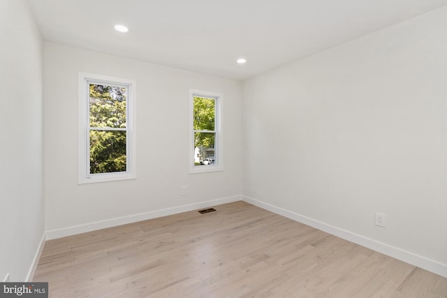 1242 Clearfield Cir, Lutherville Timonium, MD 21093 - spare room with light wood-type flooring, baseboards, visible vents, and recessed lighting
