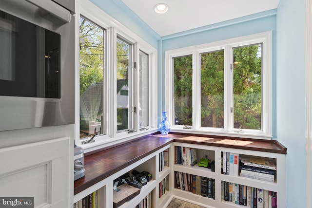 interior space featuring wall oven and recessed lighting