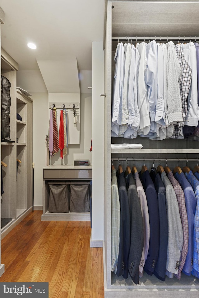 spacious closet with wood finished floors