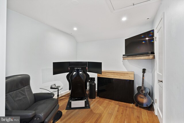 office space featuring light wood-type flooring and recessed lighting