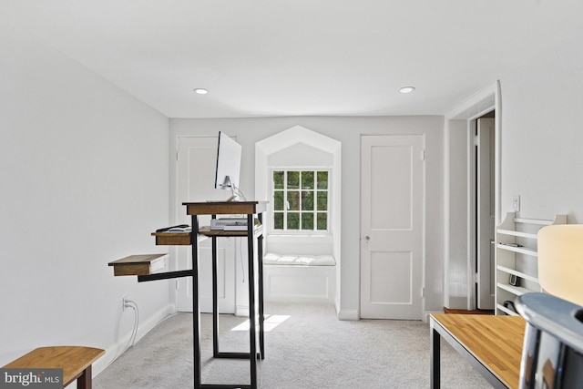 carpeted office space with baseboards and recessed lighting