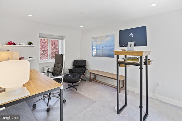 carpeted office space with baseboards and recessed lighting