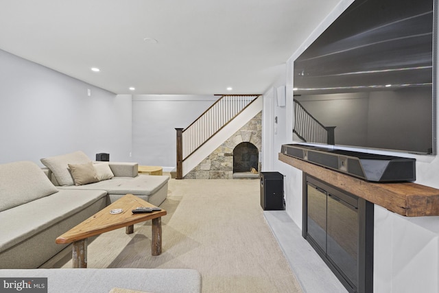 living area featuring stairway and recessed lighting