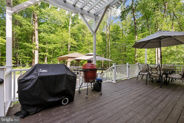 6601 Rutledge Dr, Fairfax Station, VA 22039 - wooden terrace featuring a pergola, outdoor dining area, and grilling area