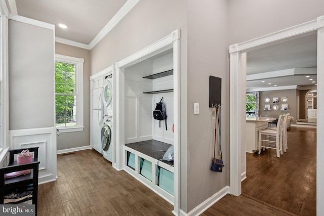 6601 Rutledge Dr, Fairfax Station, VA 22039 - mudroom with crown molding, stacked washer / drying machine, recessed lighting, baseboards, and dark wood-style floors
