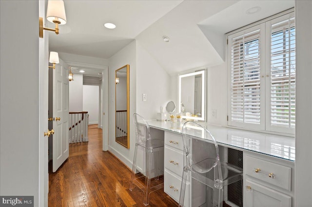 bathroom with recessed lighting, plenty of natural light, baseboards, and wood finished floors