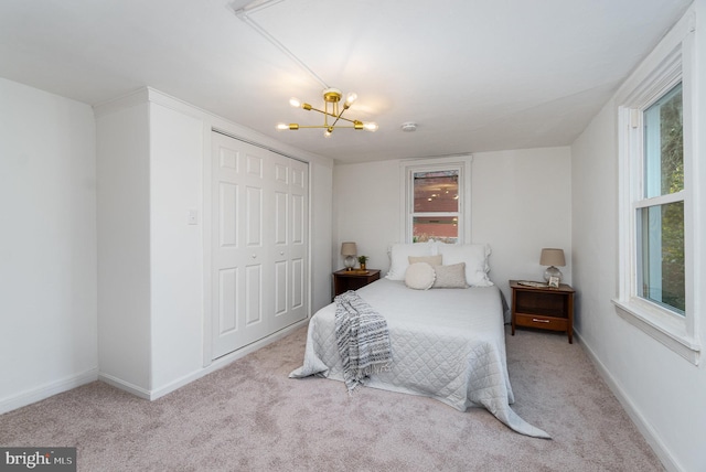 542 E Orange St, Lancaster, PA 17602 - bedroom featuring a chandelier, multiple windows, baseboards, and carpet floors