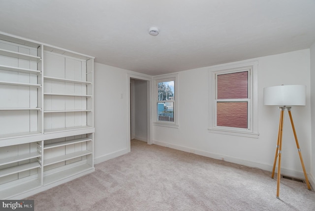 542 E Orange St, Lancaster, PA 17602 - spare room featuring carpet flooring, visible vents, and baseboards