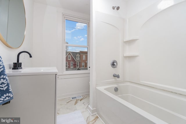 542 E Orange St, Lancaster, PA 17602 - full bath with shower / washtub combination, vanity, visible vents, marble finish floor, and baseboards