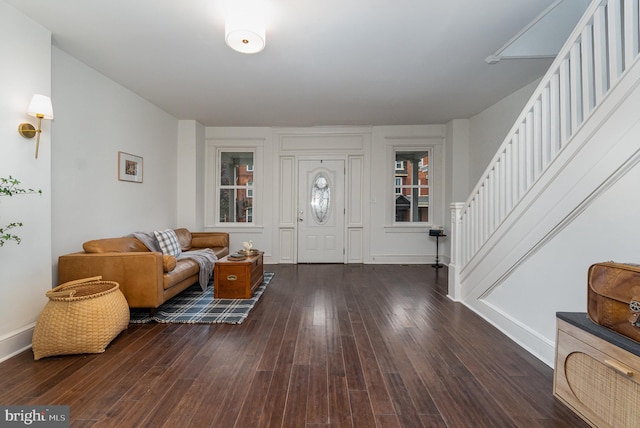 542 E Orange St, Lancaster, PA 17602 - foyer featuring stairway, baseboards, and wood finished floors