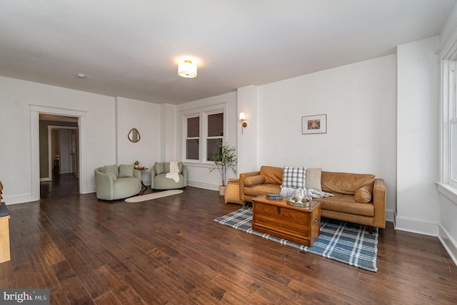 542 E Orange St, Lancaster, PA 17602 - living area featuring baseboards and wood finished floors