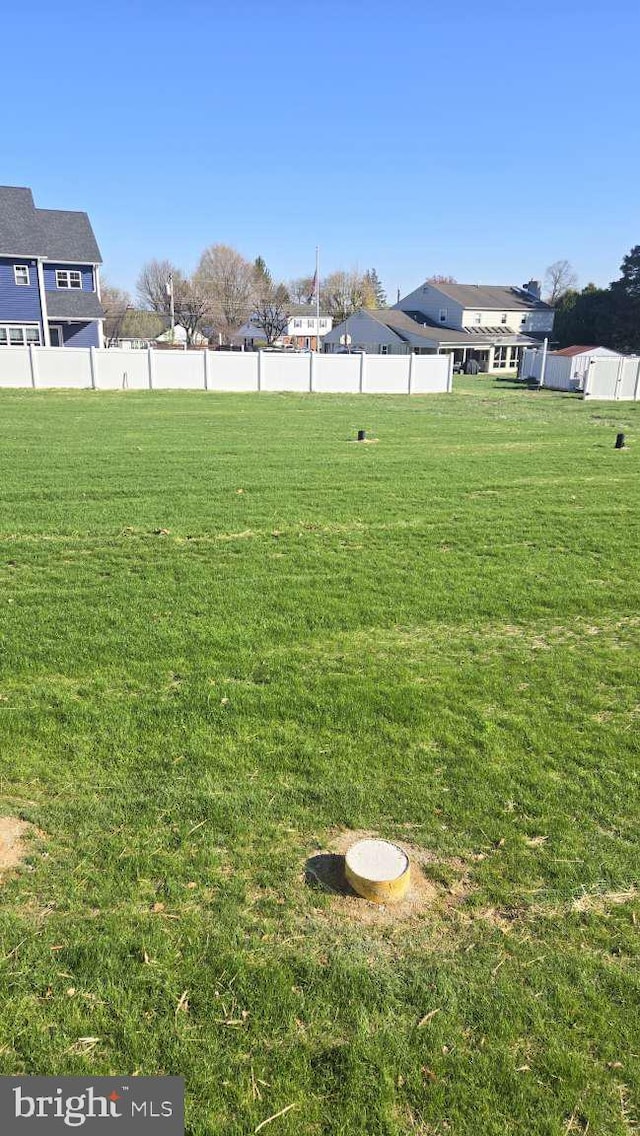 view of yard with fence