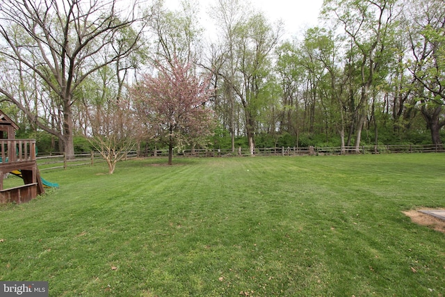 view of yard with fence