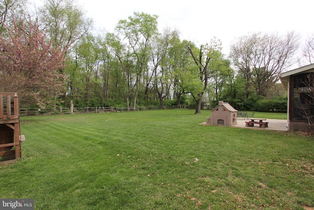 view of yard with fence