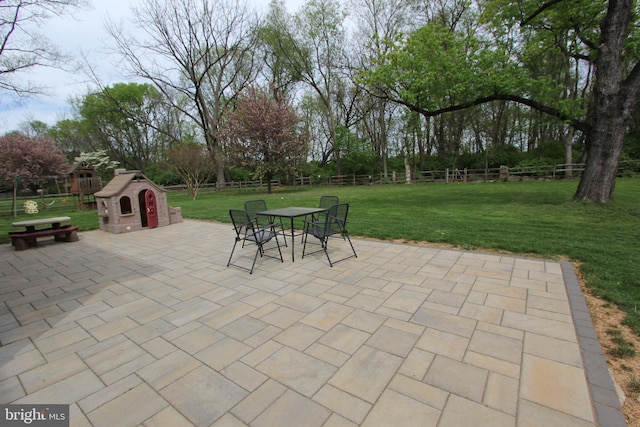 view of patio / terrace with a fenced backyard and outdoor dining space