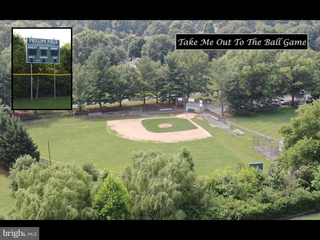 surrounding community with a yard