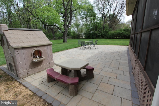 view of patio featuring outdoor dining area