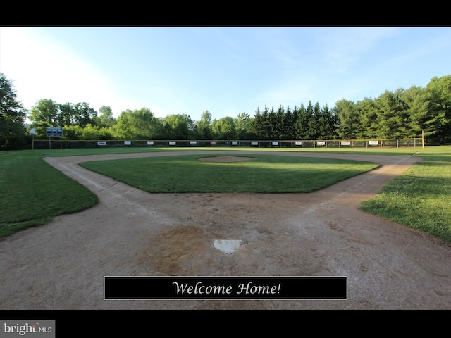 view of home's community featuring a yard