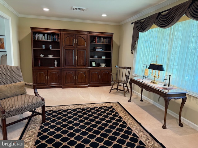 office space featuring recessed lighting, ornamental molding, light carpet, baseboards, and visible vents