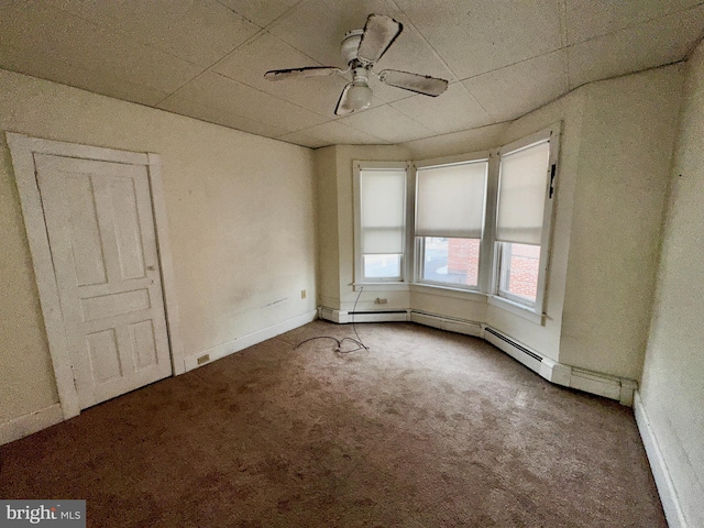 2214 Noble St, Reading, PA 19609 - carpeted empty room with a drop ceiling, a ceiling fan, and baseboards