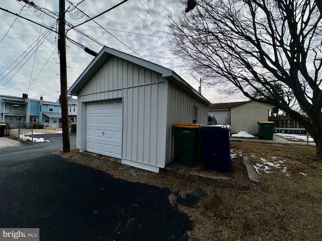 2214 Noble St, Reading, PA 19609 - detached garage featuring asphalt driveway
