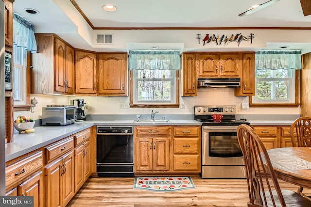 1722 Anne Ave, Baltimore, MD 21221 - kitchen with visible vents, dishwasher, a sink, under cabinet range hood, and stainless steel range with electric cooktop