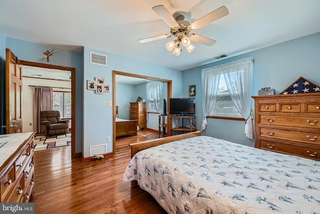 1722 Anne Ave, Baltimore, MD 21221 - bedroom with wood finished floors, baseboards, and visible vents